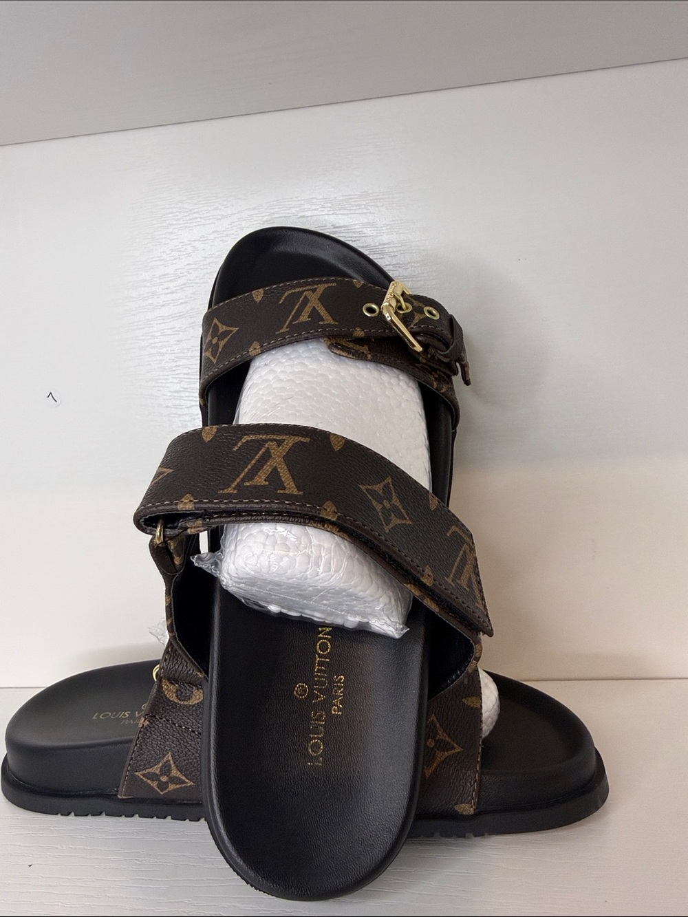 Sandal-like branded straps
